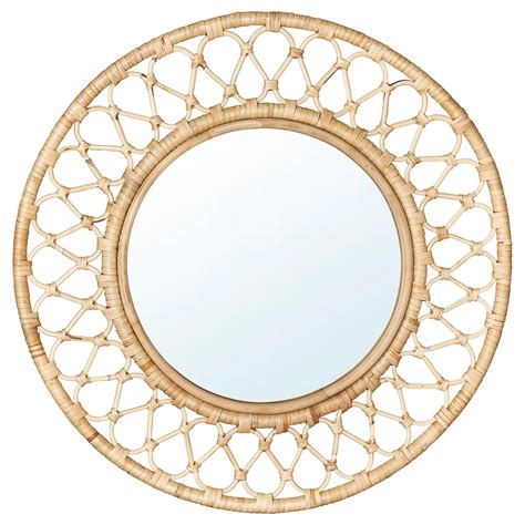 Then hang tomorrows outfit behind the mirror and allow yourself a few more minutes under the covers. . Rattan mirror ikea